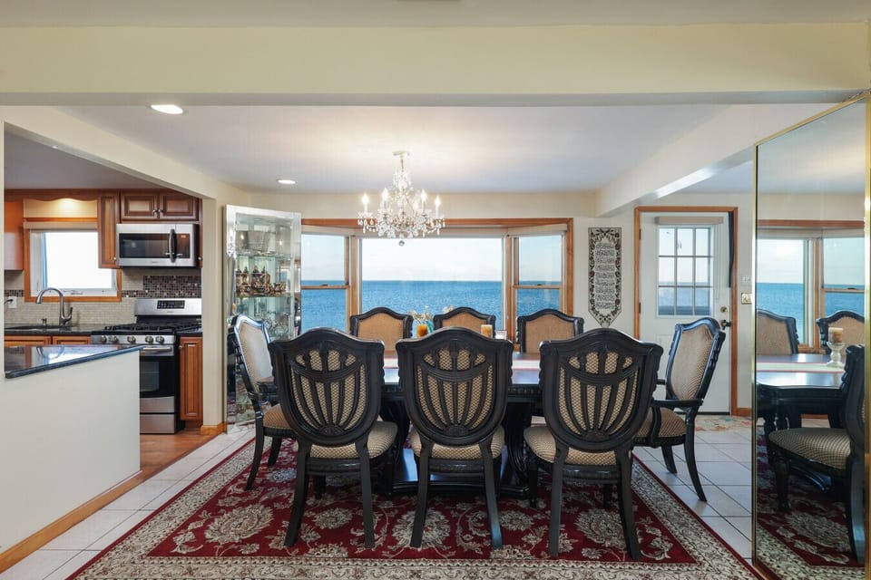 Dine in elegance with breathtaking ocean views as the backdrop