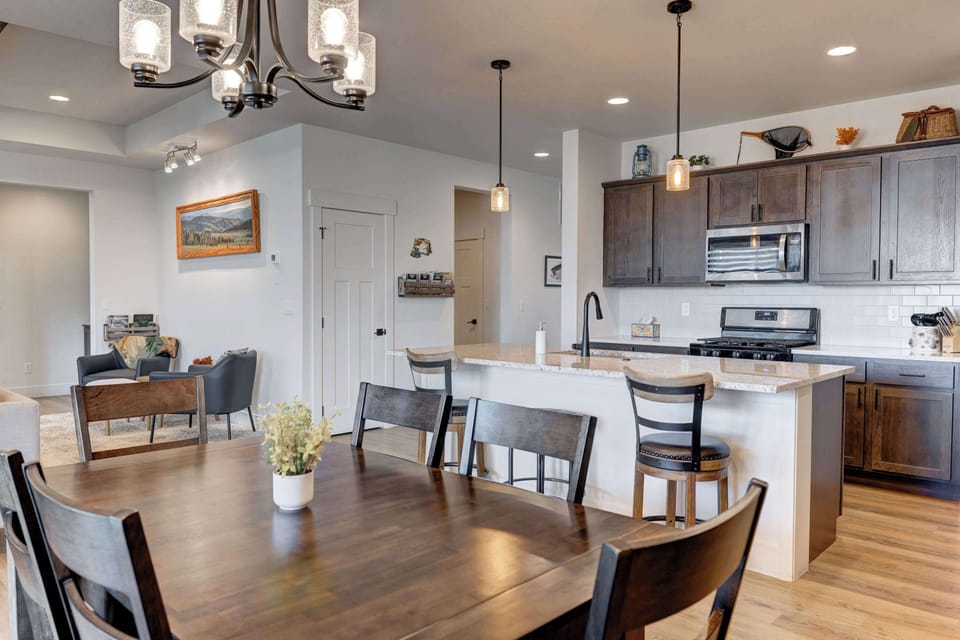 Dining Room: The 6 seater dining area offering a picturesque view, enhancing the dining experience.