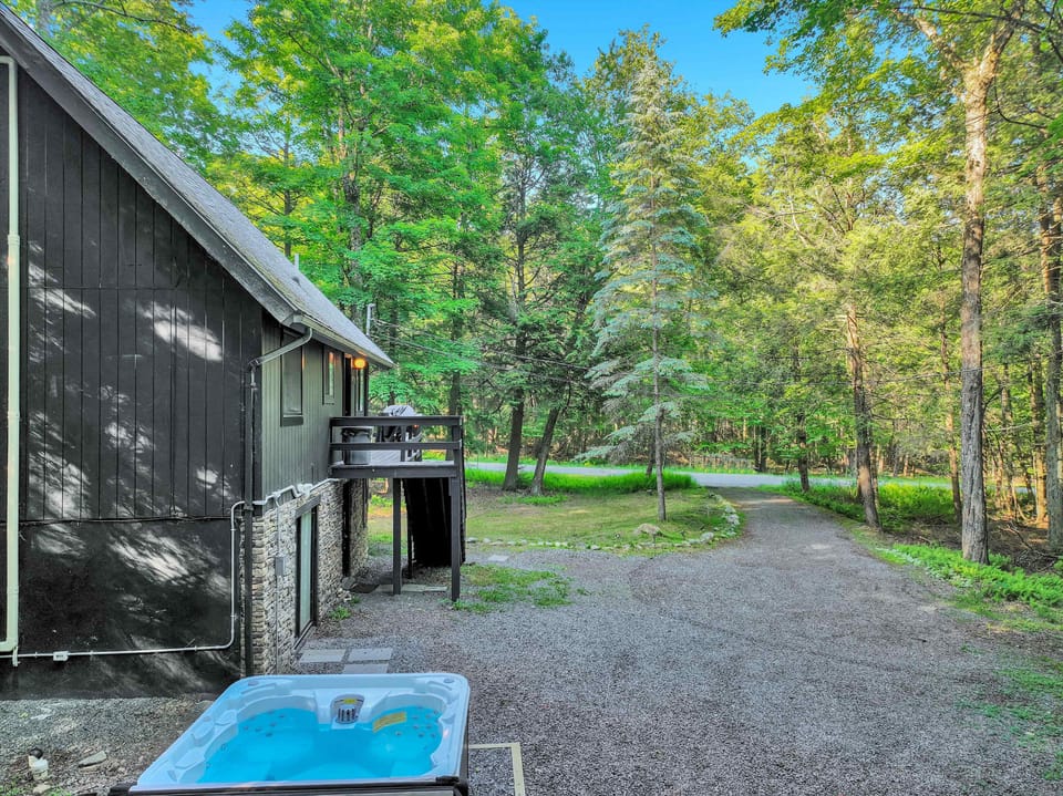 Private Woodland Retreat with Hot Tub & Spacious Yard