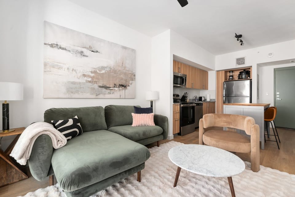 Find your favorite spot in this comfortable and stylish contemporary living space, featuring a chic accent chair.