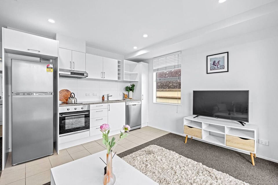 The kitchen and living room occupy the open-plan space.
