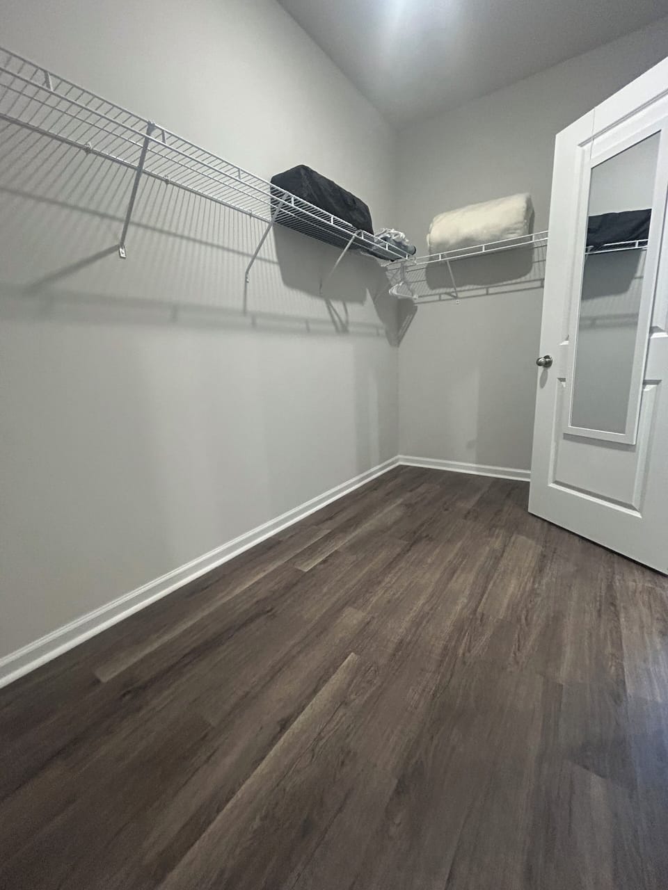 Spacious walk-in closet off master bath with pack and play