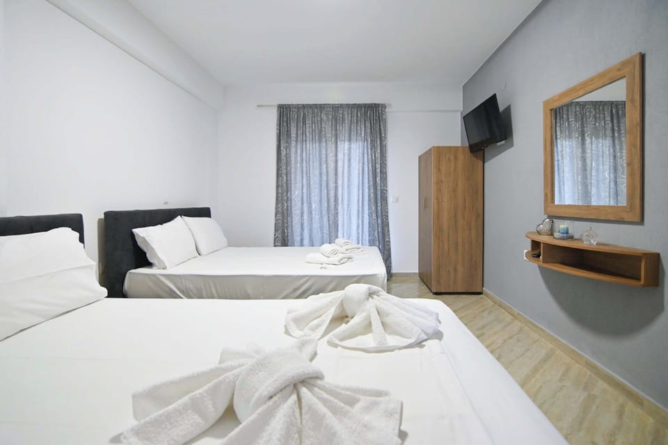 Rest well in this simple, quiet space with a comfy bed.