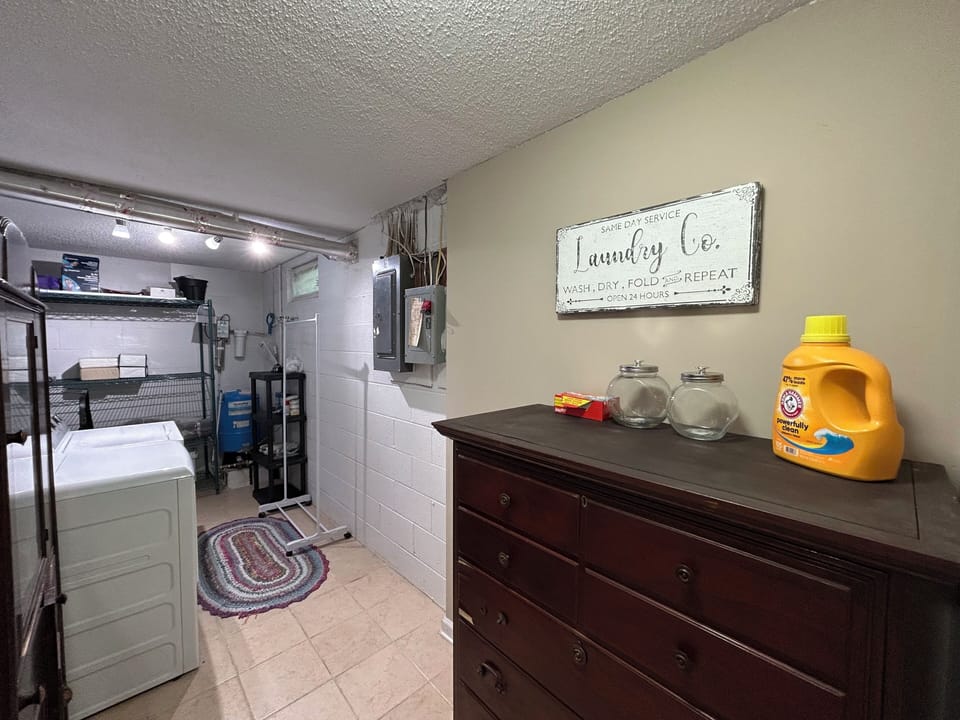 Laundry room with detergent and dryer sheets included