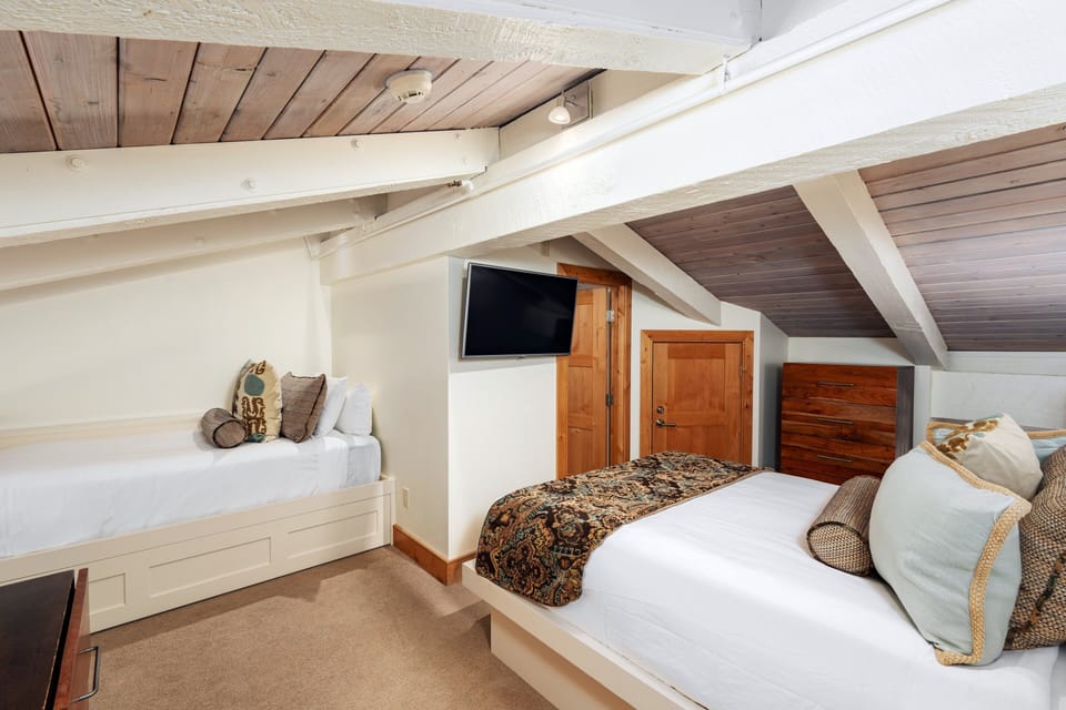 Queen Bed, Twin Bed, and a Trundle