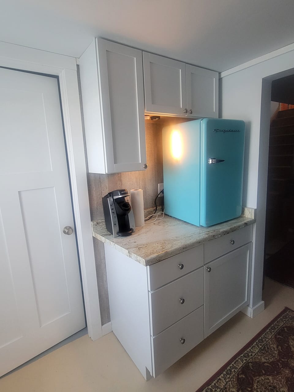 Service cabinet with extra little fridge.