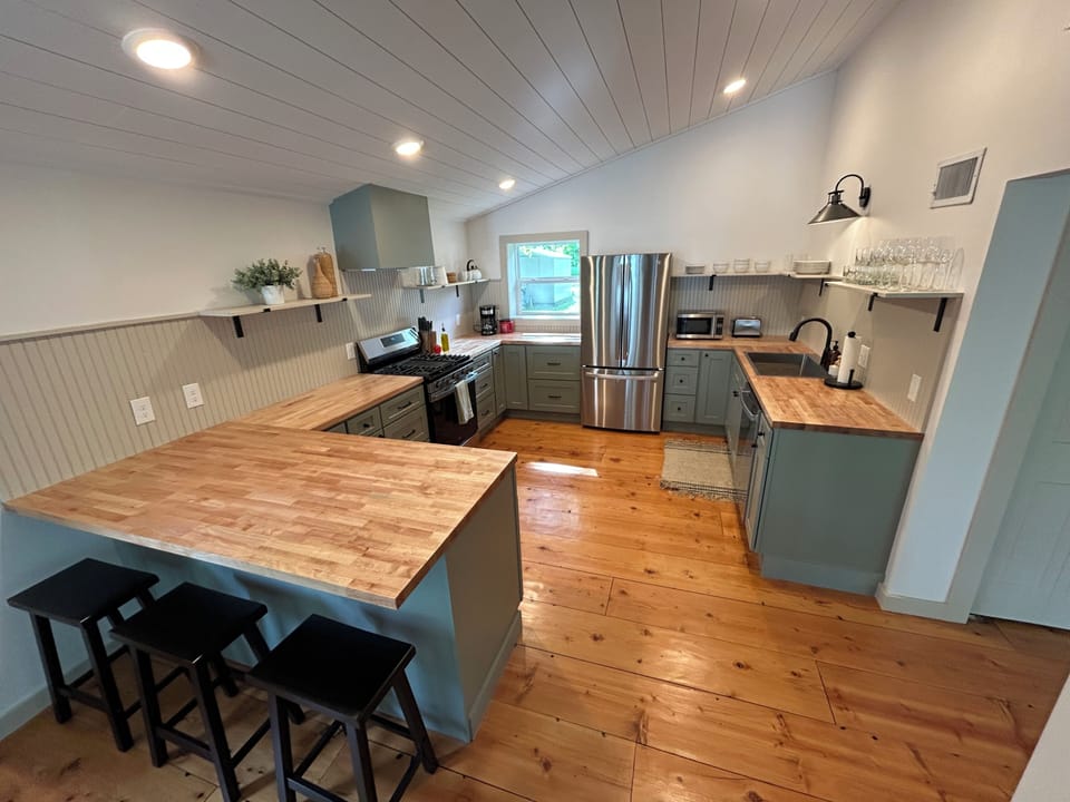 Full kitchen equipped with cooking everything you need to cook meals