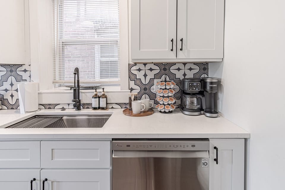 Start your mornings right with our dedicated coffee station featuring a Keurig coffee maker, a variety of coffee essentials you need for a perfect brew.