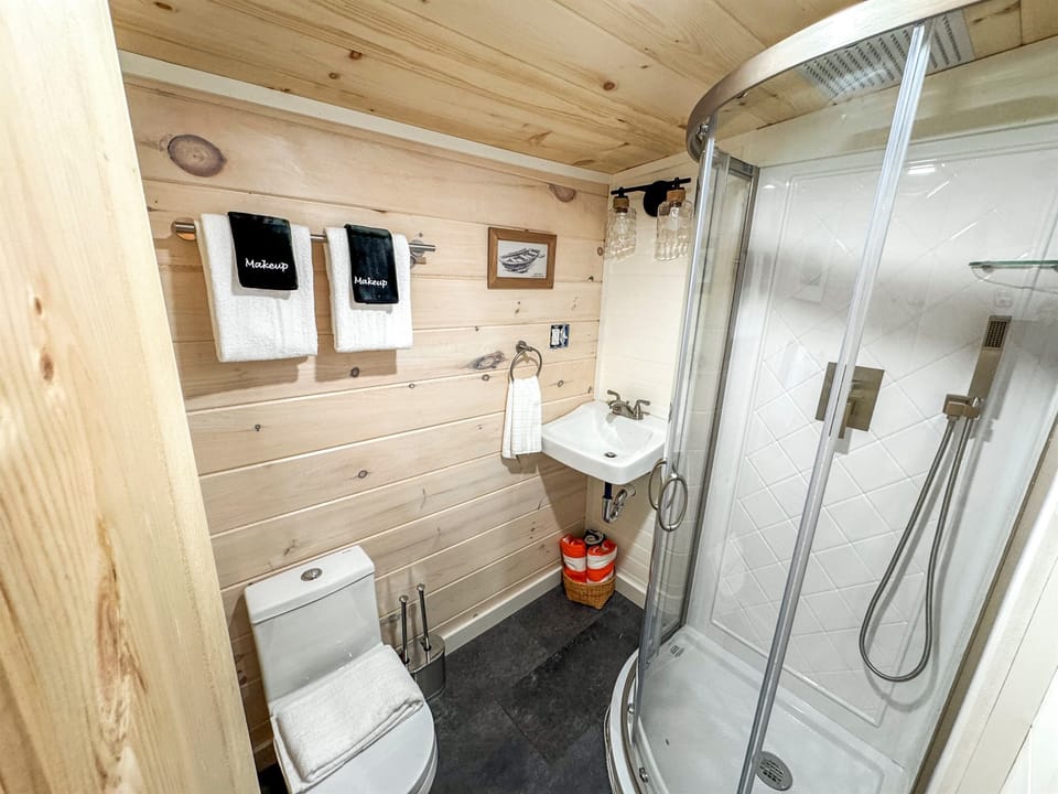 is small but equipped! Brand new stand up shower, toilet and vanity.