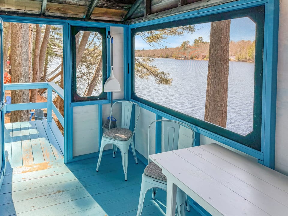 Indoor living with 2 chairs and 1 table"