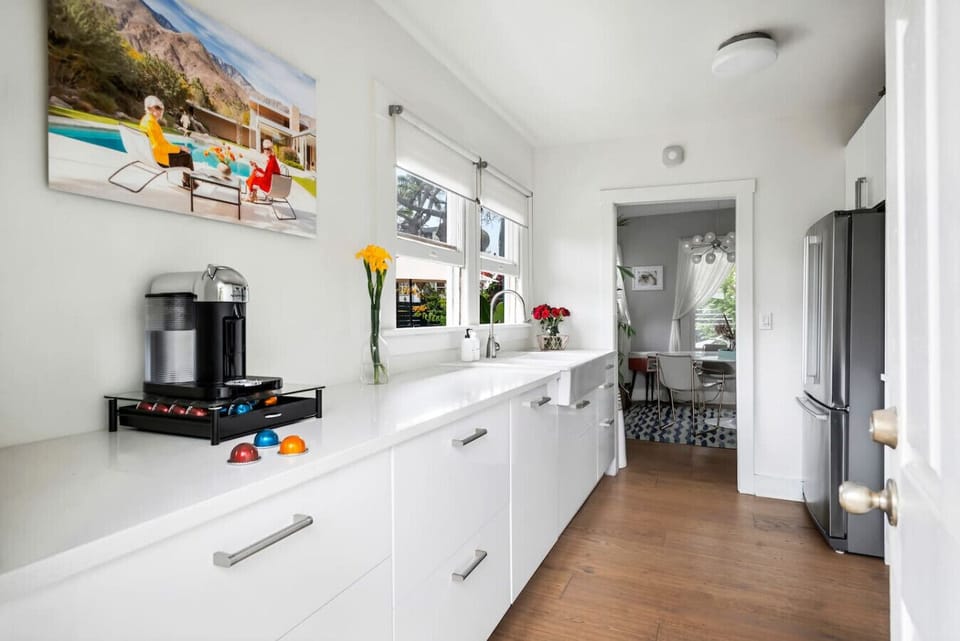 Where function meets finesse—crisp white counters, endless possibilities.