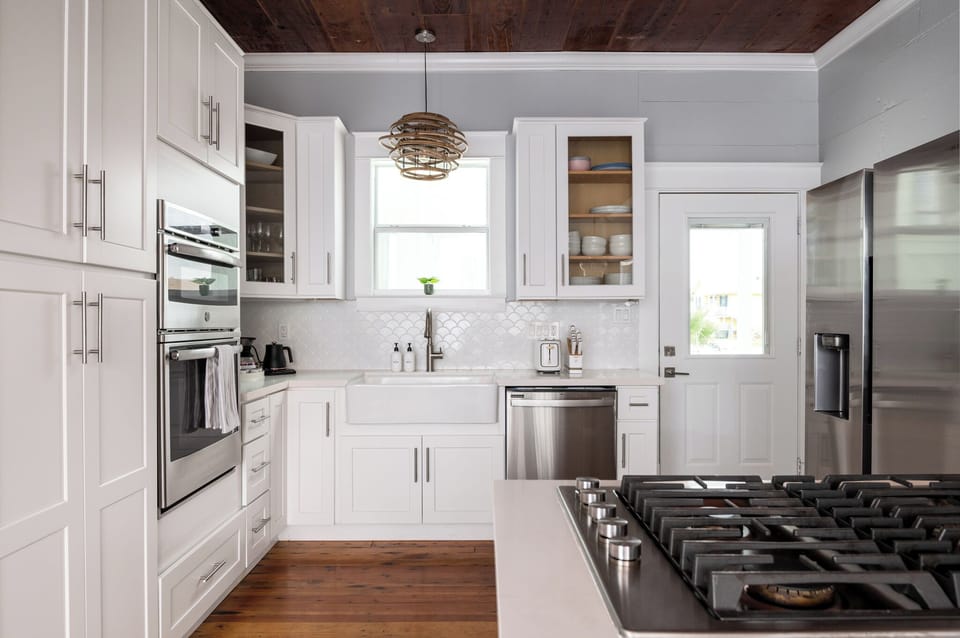 Cook with ease using a gas stove, full-size oven, and stocked essentials