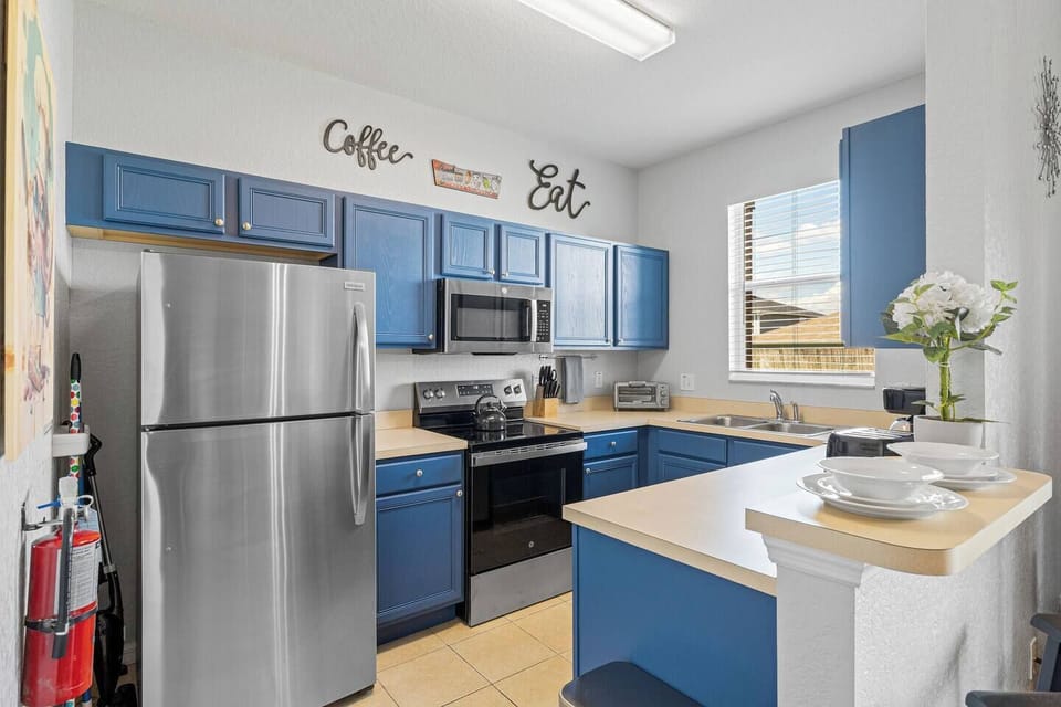 Modernized kitchen showing major appliances and storage