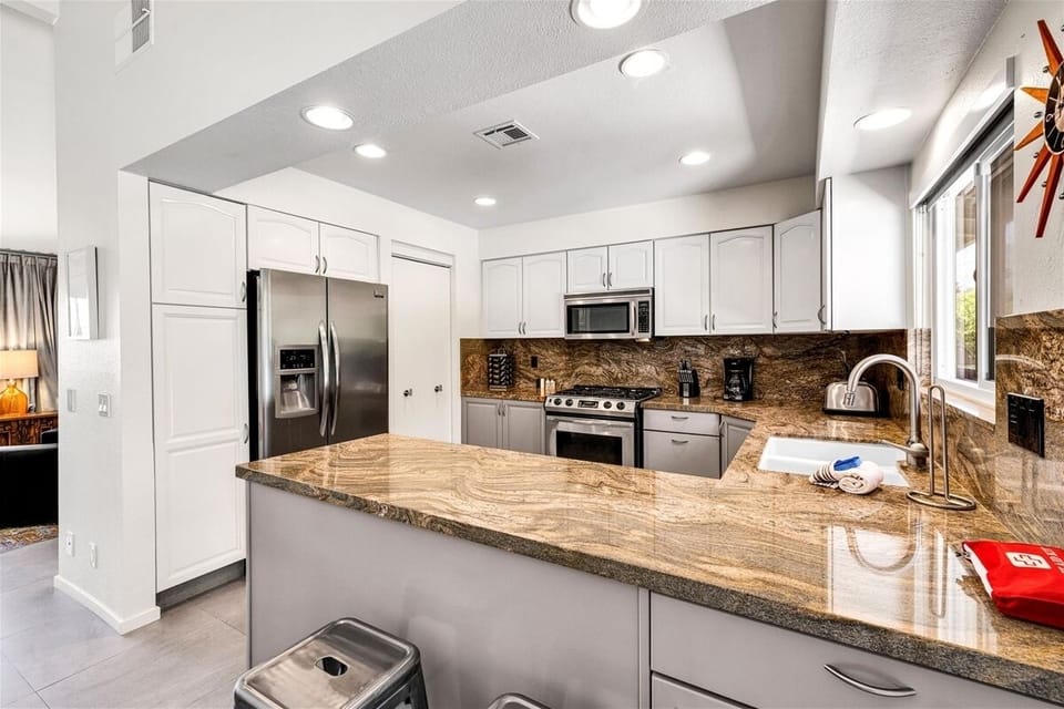 Fully equipped kitchen is a culinary haven w/ modern appliances to make meals