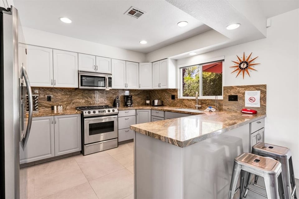 Fully equipped kitchen is a culinary haven w/ modern appliances to make meals