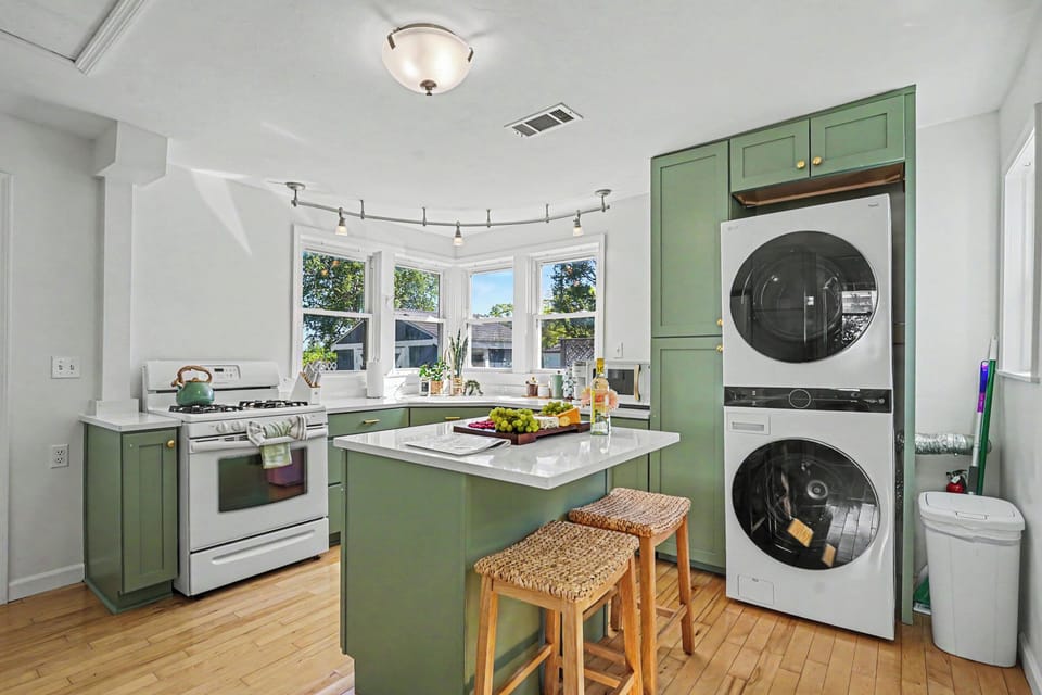 Enjoy lake views through large kitchen windows while you cook or sip coffee
