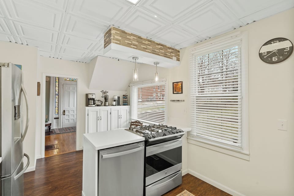 Kitchen with gas stove and oven.