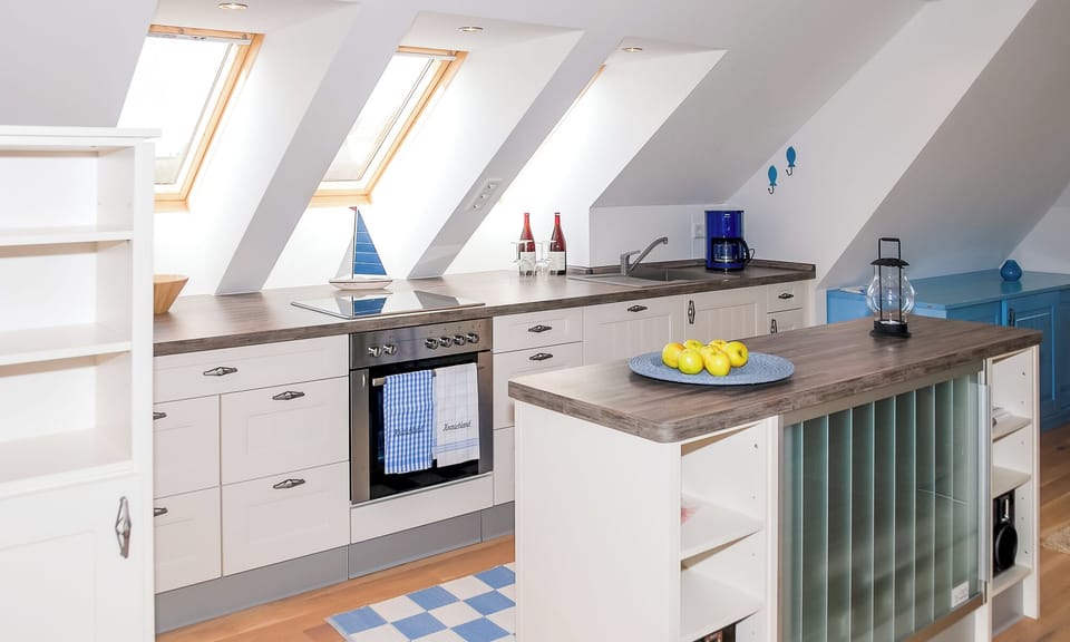 Modern Kitchen with Wooden Countertop and Skylights