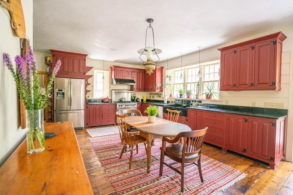 Chef's kitchen with eat in dining and stocked well stocked with cooking supplies. 