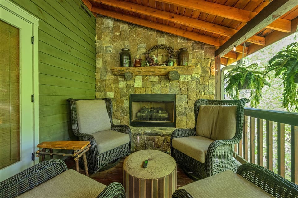Enjoy the outdoor fireplace with plush seating on the entry-level deck.