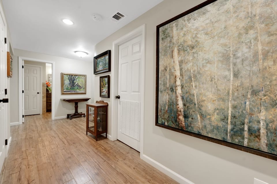 Hallway leading to lower-level bedrooms.