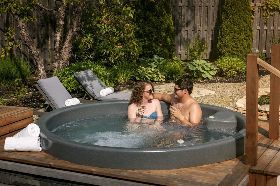 Share quiet laughter and warm conversation surrounded by whispering trees and evening calm.