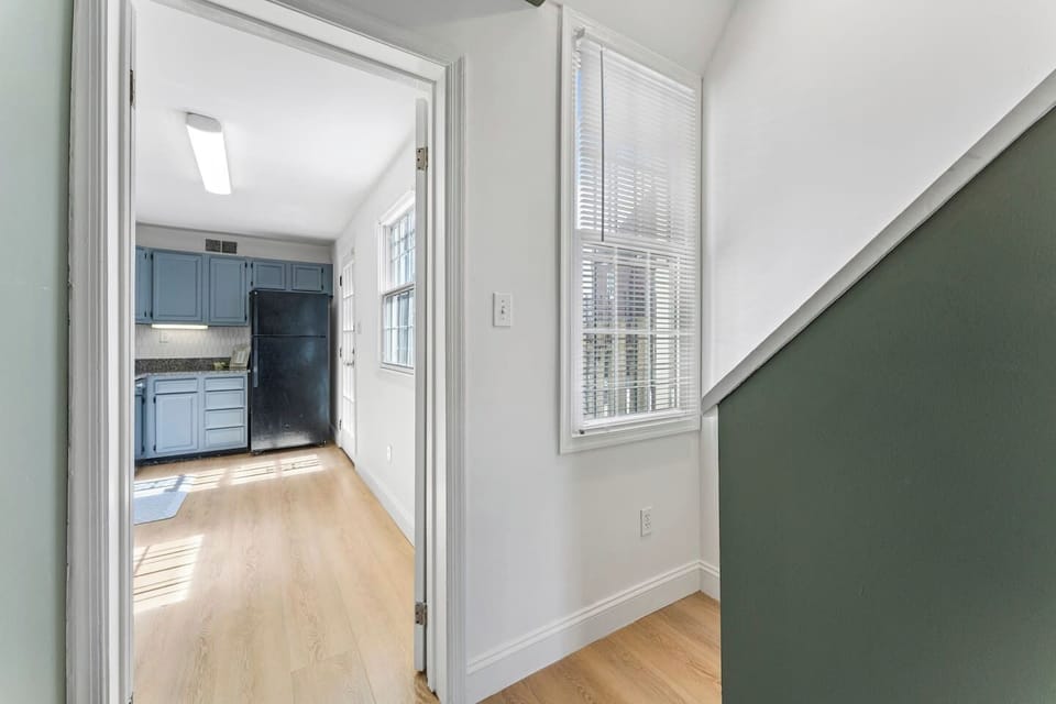 Comfortable dining space with seating for the whole group, conveniently located near the kitchen