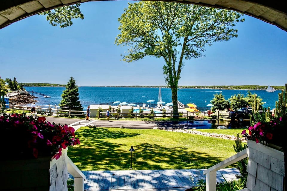 Gaze out over the lawn and harbor beyond, where the breeze is gentle and the view stretches as far as your plans are free.
