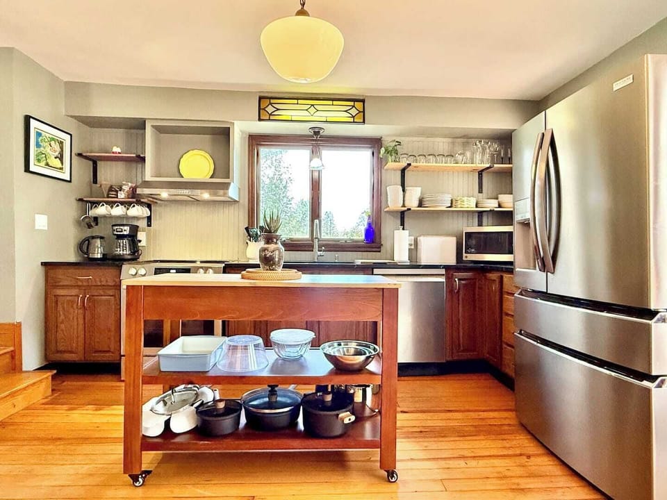 Bright, welcoming, and thoughtfully stocked, this kitchen invites home-cooked memories and effortless entertaining.