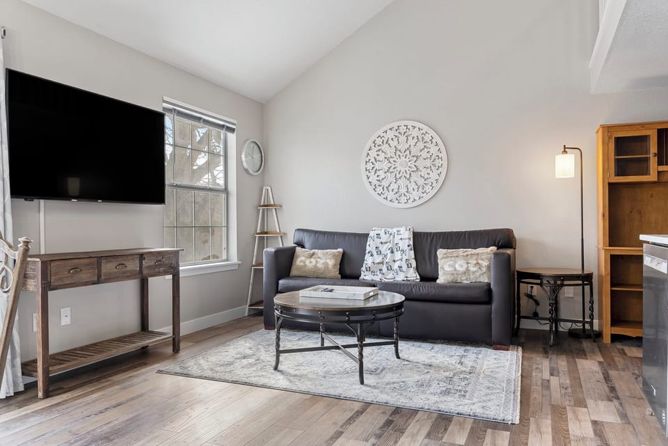 Cozy living space with seating and entertainment options.