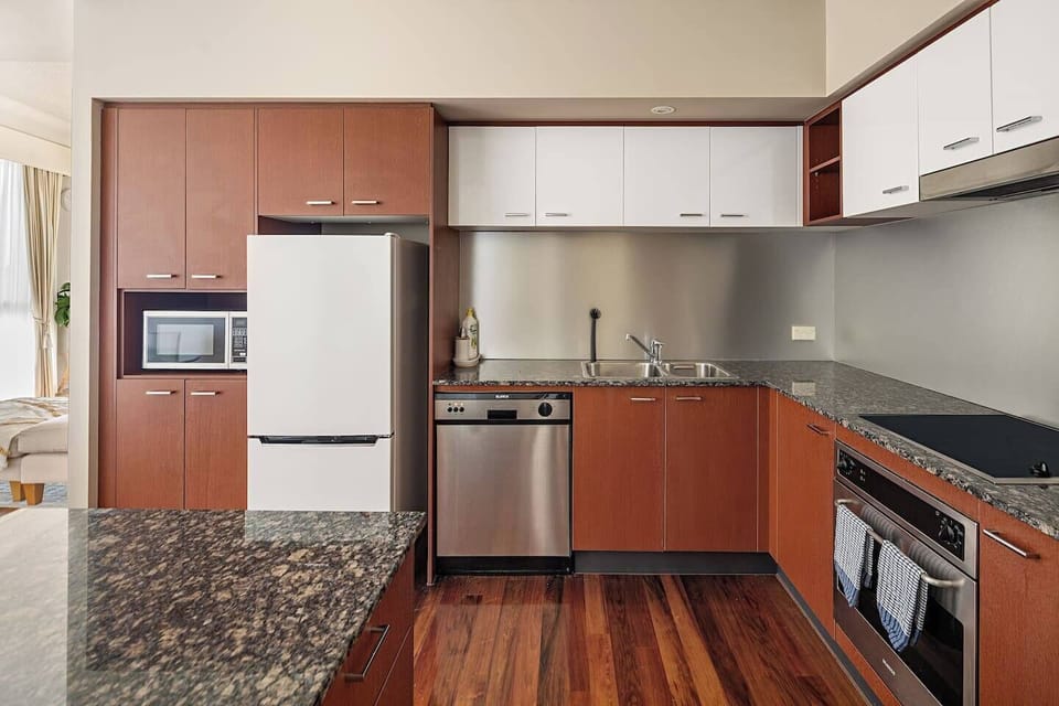 Whip up casual breakfasts or family dinners in the fully equipped kitchen, complete with an oven, dishwasher, fridge, microwave and essentials needed for home-style cooking.