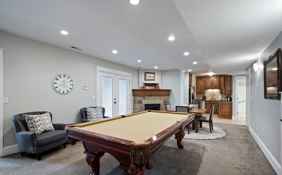 Pool table off of the full kitchen makes for a great gathering place.