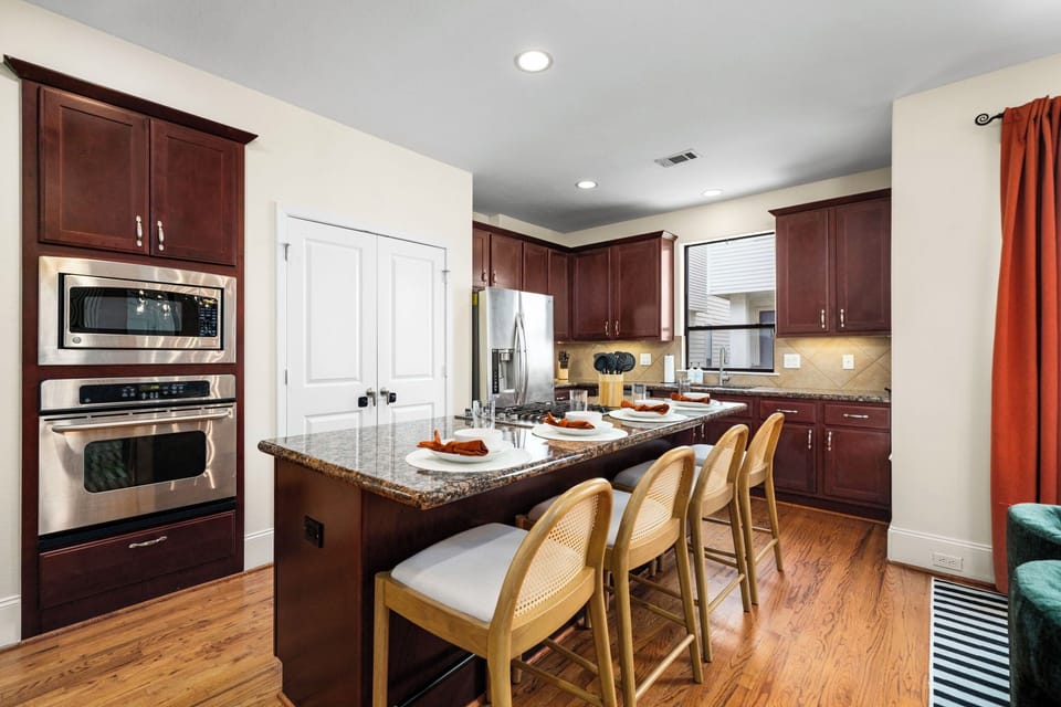 The kitchen has bar seating for 4