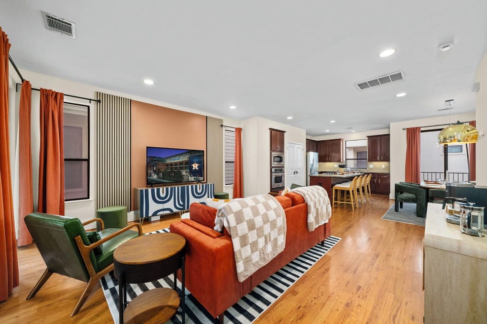 The living room is in an open floor plan concept with the diing area and kitchen