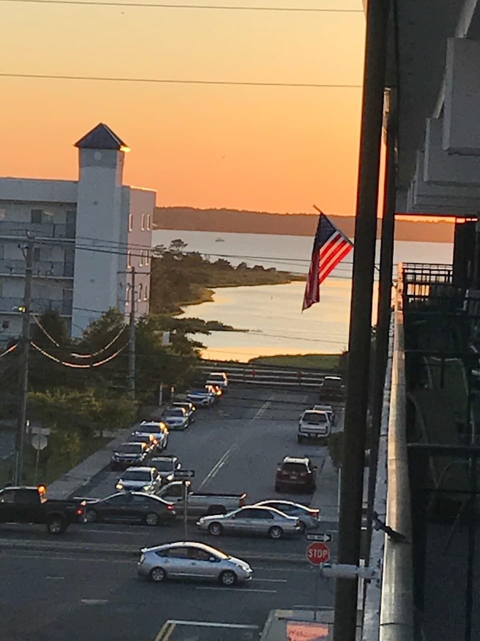 This is another sunset view taken from our balcony at Martini Sunrise. I loved the American flag showing in this one as a reminder of my ability to enjoy that sunset in a safe and peaceful place. I always am thankful to those that serve our country and provide me this peaceful view. 