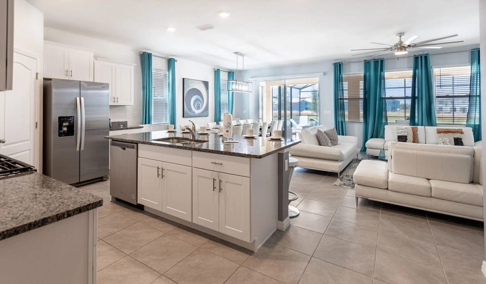 Kitchen overlooking the living room and pool