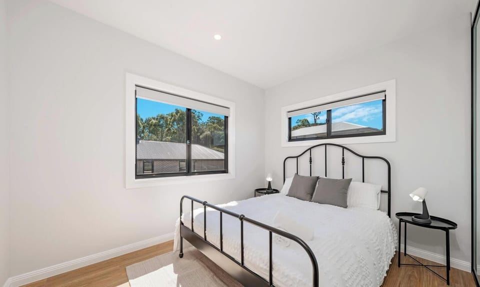 Bright and comfy bedroom with fresh bedding
