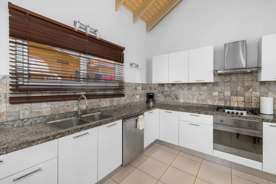 Welcome to the heart of the home! This sleek kitchen is ready for your culinary adventures. With plenty of space and modern appliances, it’s perfect for whipping up your favorite meals!