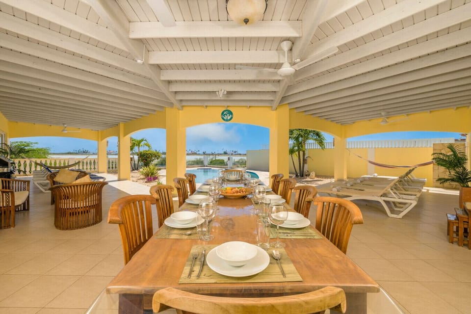 Gather your friends and family for unforgettable meals in this beautiful dining space at Villa Vista! Enjoy great food and stunning views!