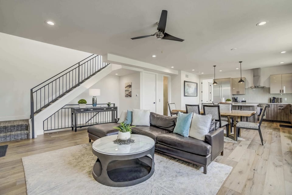 Elegant open-concept layout with modern furnishings, sleek finishes, and a seamless flow from living to dining. Perfect for relaxation and entertaining guests.


