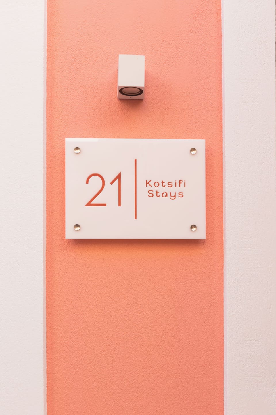 The property's sign adds a personal touch to the entrance