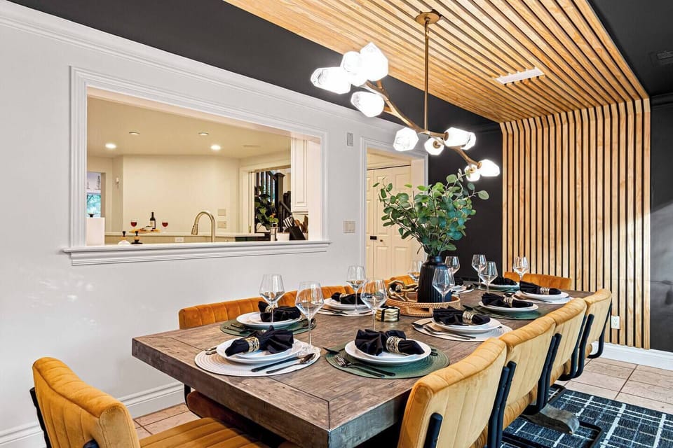 Classic elegance and modern charm blend in this formal dining room.