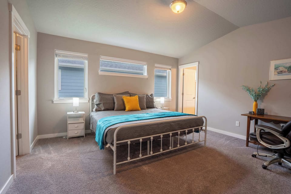 Peaceful king suite with ensuite bath — a calm, hotel-inspired retreat.