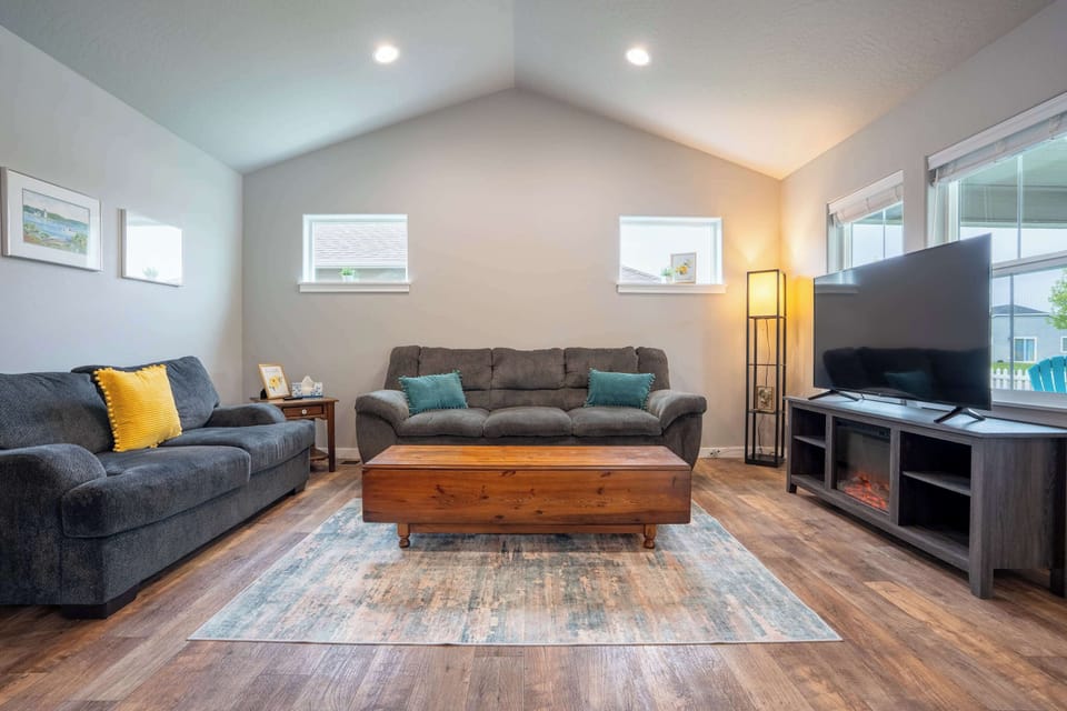 Bright, open-concept living area with natural light — designed for comfort and easy gathering.