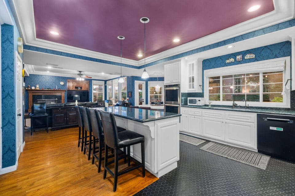 Host with ease in this open-concept kitchen that flows beautifully into the living and dining areas.