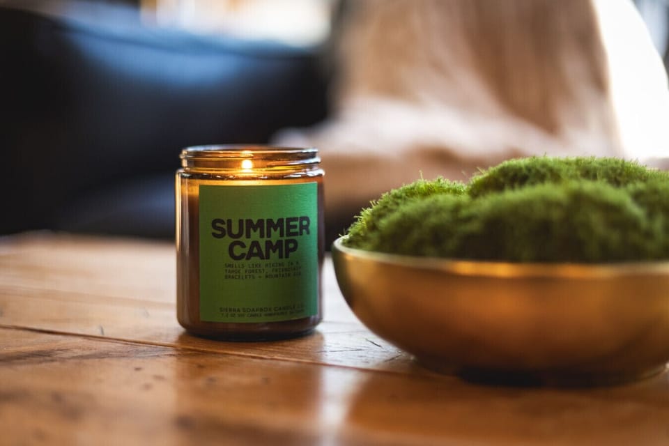 Set the mood. Light the ‘Summer Camp’ candle and fill the space with nostalgic forest scents—think Tahoe trails, mountain air, and peaceful campfire vibes