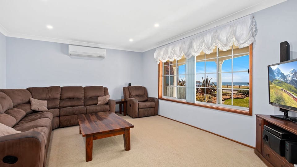 Lounge room with direct view to ocean