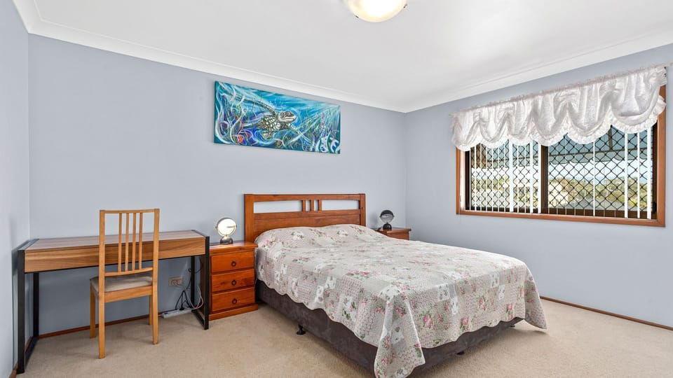Downstairs bedroom with bathroom/laundry off this room 