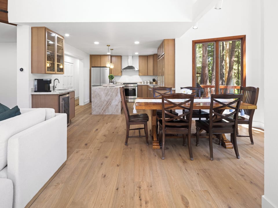 Open concept dining and kitchen overlooking the Northstar golf c