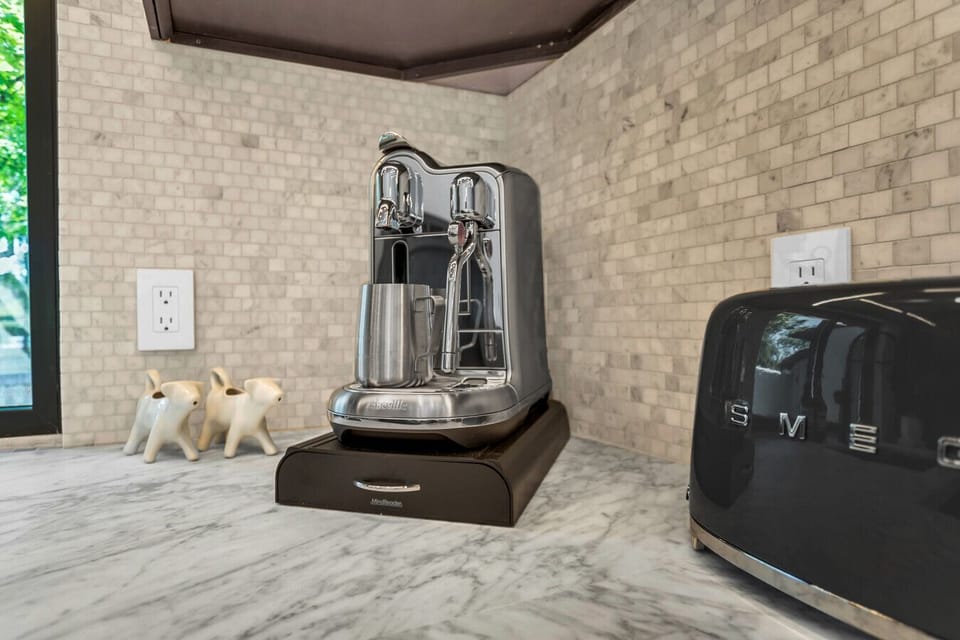 Mornings made better with a fresh brew from our Nespresso machine and a perfect toast from our SMEG